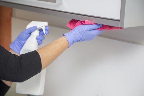 Cleaning equipment and PPE used in a safe workplace